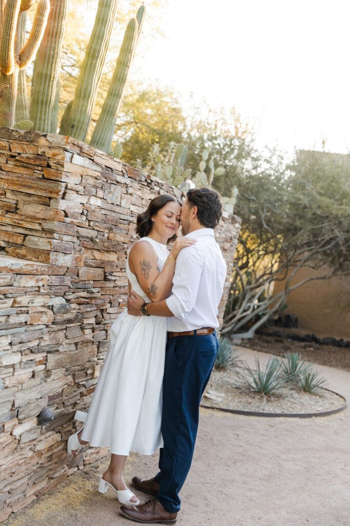 Desert stone couple engagement portraits. 