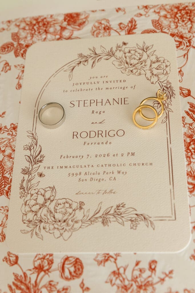 Bride & Groom's save the date invitation with wedding/ engagement rings.