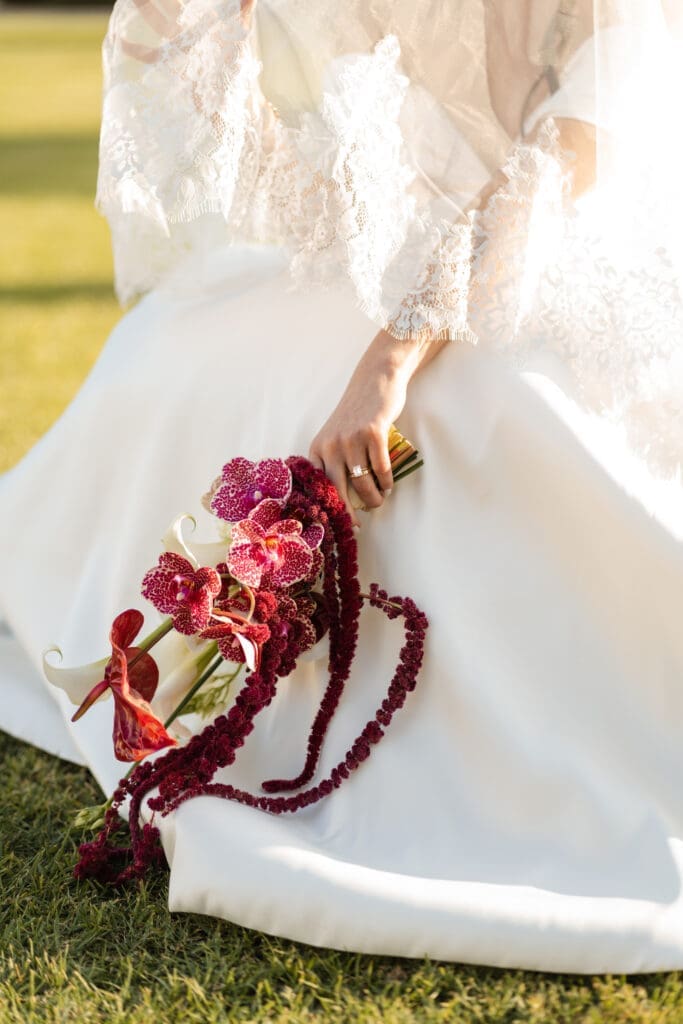 Spotted pink and white cascading bridal bouquet, dark romantic botanicals
