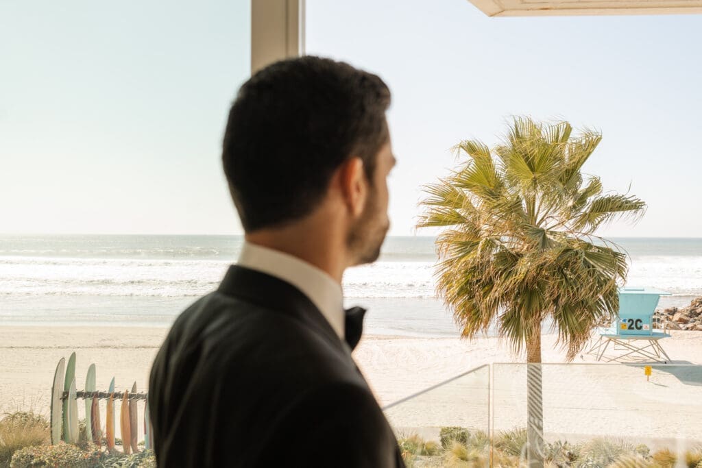 Grooms portrait overlooking California ocean